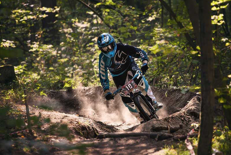 cyclist riding his bike on a terrain way